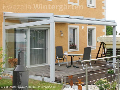 Terrassenüberdachung - Glas-Aluminium - Wetterseite mit Schiebeverglasung ausgestattet
